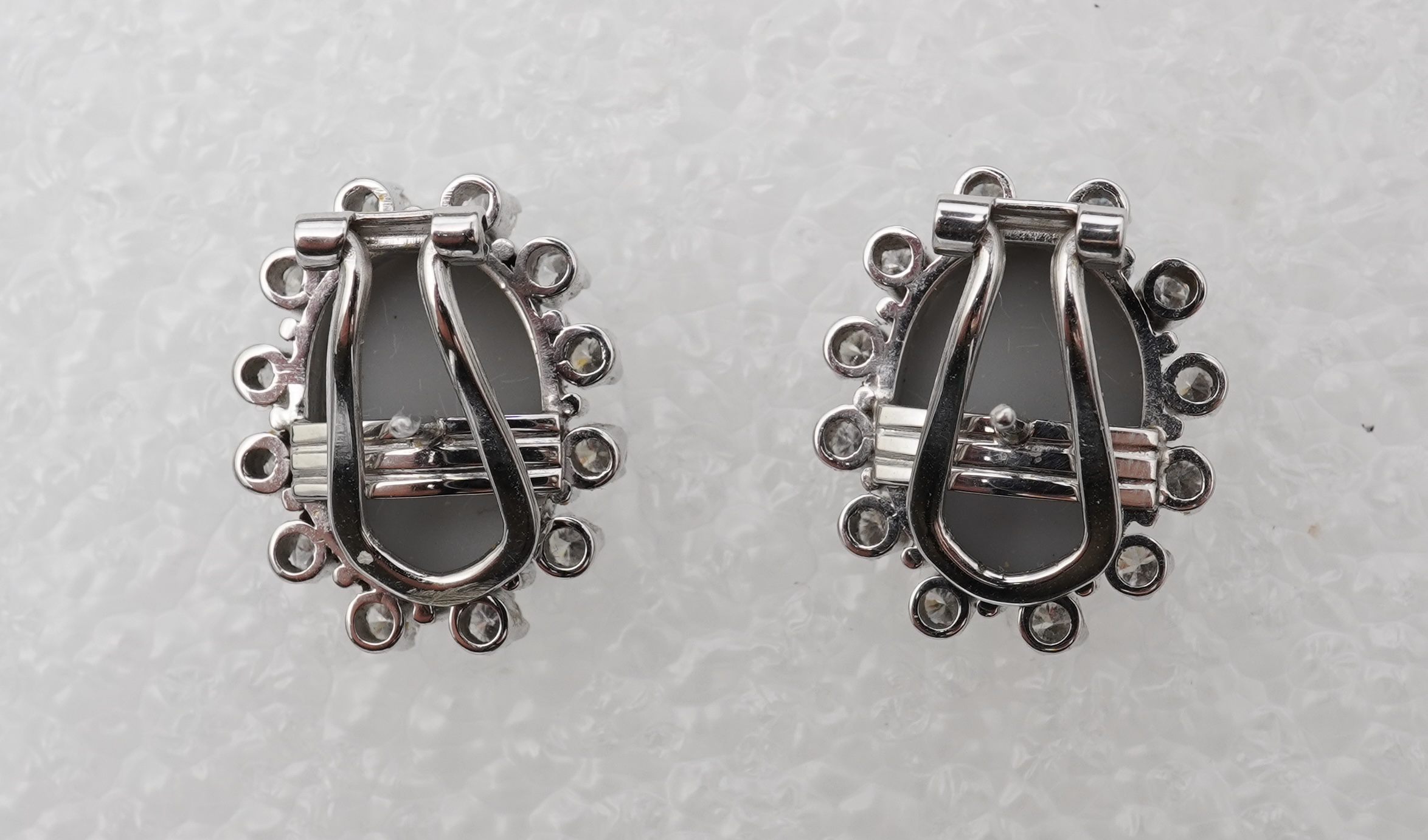 A pair of opal triplet and diamond earrings